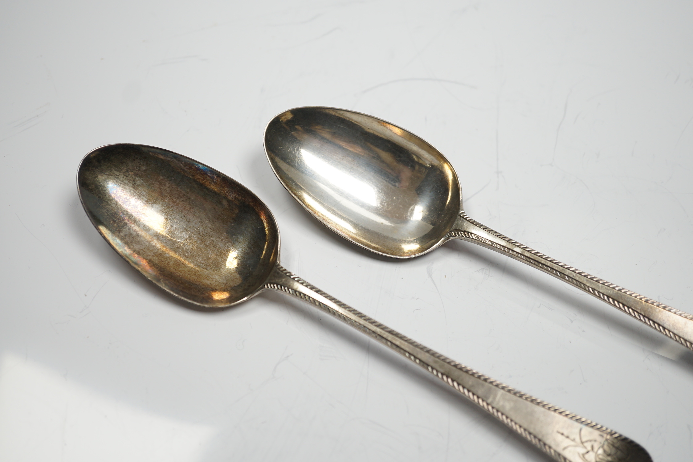 A pair of George III silver feather edge Old English pattern table spoons, by Hester Bateman, London, 1778, 21.4cm, 4oz.